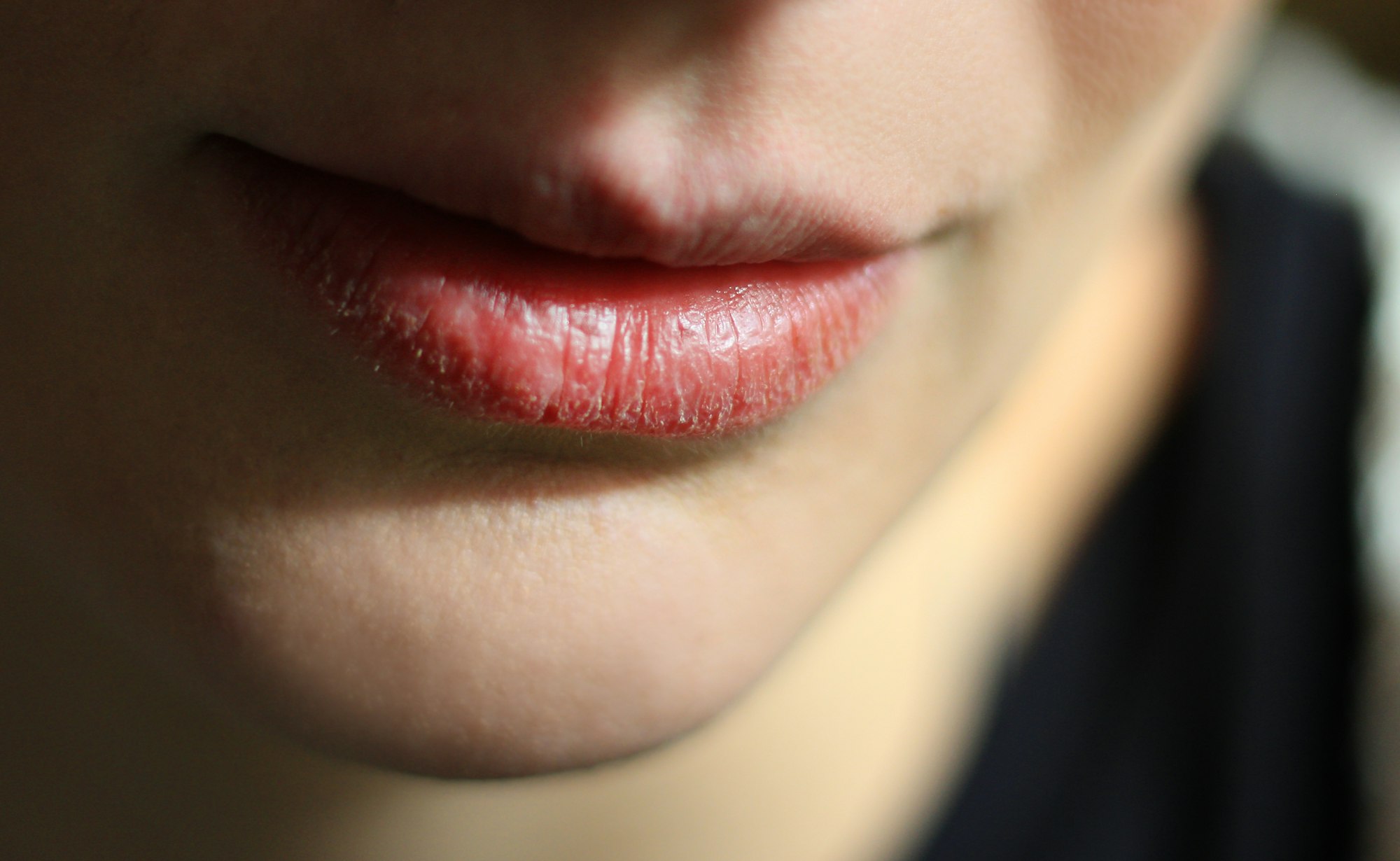 Lips of young woman, texture of the lips